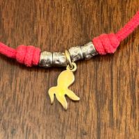 Collana con ciondolo  DoDo in oro 18Kt