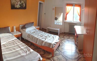 Stanza singola con letto matrimoniale