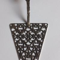 Palettina in argento 800 traforata.