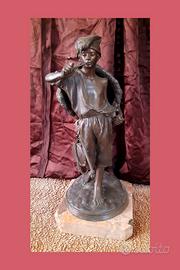 Bronzo contadino con ceste su marmo Fior di Pesco