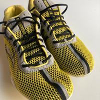 Scarpa da running Brooks per pista e campestri.