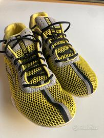 Scarpa da running Brooks per pista e campestri.