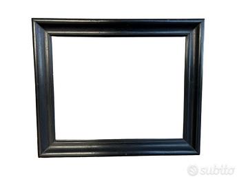 Cornice antica in legno ebanizzato