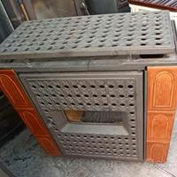 Stufa a legna NUOVA, in refrattari, ghisa maiolica