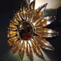 specchio più orologio da muro.