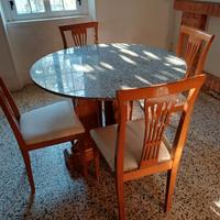 Tavola rotonda con piano in marmo