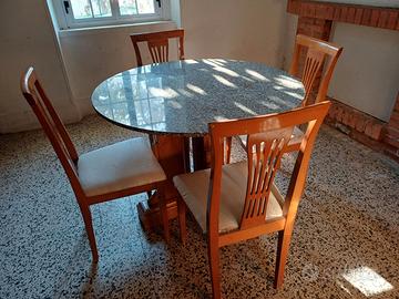 Tavola rotonda con piano in marmo