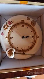 orologio a pendolo Thun con cuori 