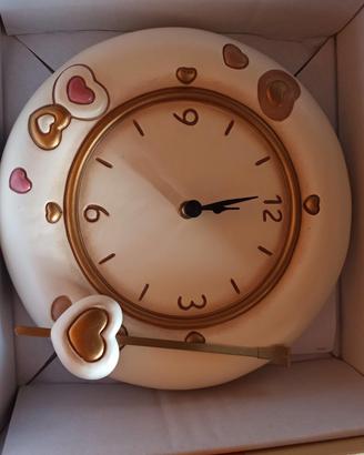 orologio a pendolo Thun con cuori 