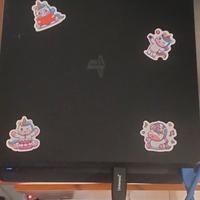 PlayStation 4 con due joystick