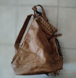 zainetto monospalla borchie