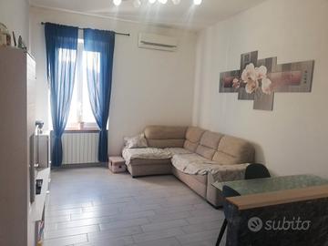 Appartamento con porzione di giardino esclusivo 
