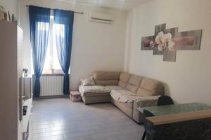 Appartamento con porzione di giardino esclusivo 