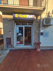 Sala scommesse e capsule caffe