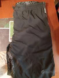 pantaloni lunghi Versace uomo 