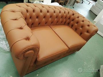 Divano in pelle due posti lavorazione capitonné