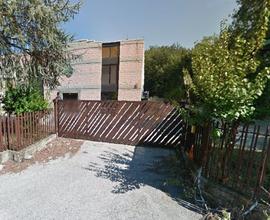 Porzione di capannone ad uso magazzino