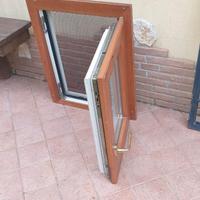 Infisso 55x67, zanzariera e grata in ferro 57x71