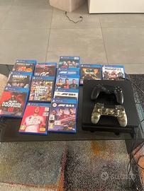 ps4 slim + 2 joystick e alcuni giochi