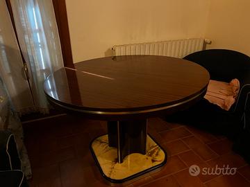 Tavolo tondo allungabile, base in pietra