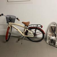 Bicicletta con seggiolino