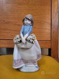 Lladro statuina fioraia