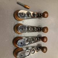 Manovelle finestrini e pomelli chiusura portiere