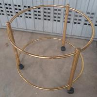  tavolino rotondo con rotelle e mensole in vetro 