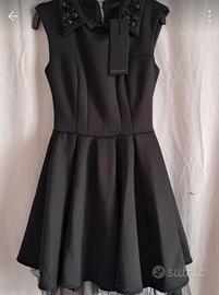 Abito Mangano nuovo con cartellino