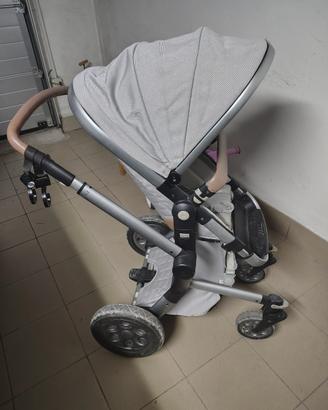 Passeggini + seggiolone + triciclo + sacco nanna