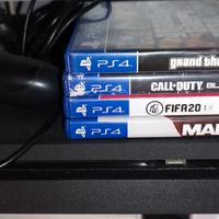 PlayStation 4 + 4 giochi