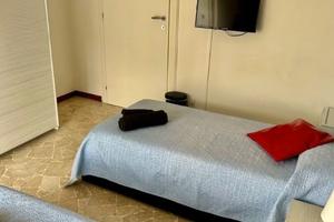 Posto letto in trilocale con giardino e terrazzo