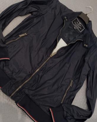 giubbotto anti pioggia blu