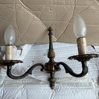 Quattro Appliques due luci in bronzo