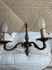 Quattro Appliques due luci in bronzo