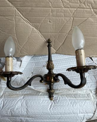 Quattro Appliques due luci in bronzo
