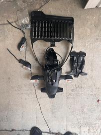 Porta targa protezione radiatore