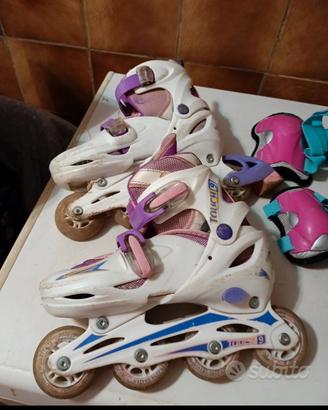 pattini a rotelle num. 36/37 più paracolpi 