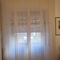 Tende a pannelli con binario Arquati (n. 2)