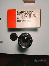 Canon A1 + obbiettivi + winder + scatole orginali