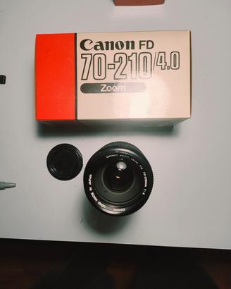Canon A1 + obbiettivi + winder + scatole orginali