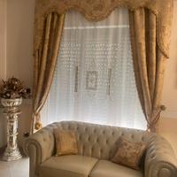 Due bellissime tende complete con binari