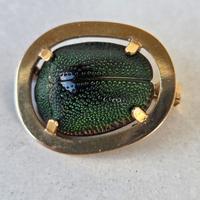 Spilla d'oro 18 carati con scarabeo vero anni '80.