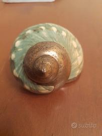 Conchiglia laminata in argento 925.