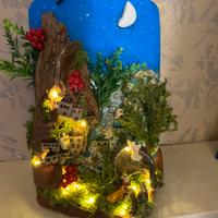 Presepe su pietra e legno