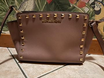 Borsa borchie oro Michael Kors