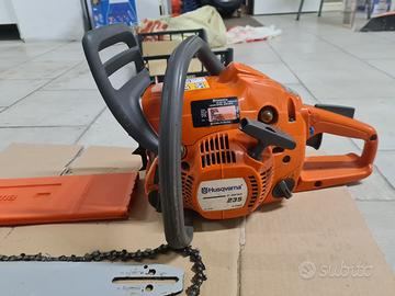 motosega Husqvarna 235 più  potatura 