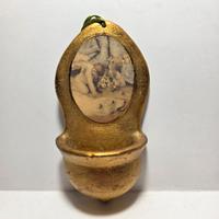 Acquasantiera  terracotta dorata con stampa putti