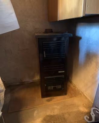 Stufa a legna con tubi