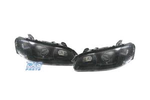 FARI PER OPEL OMEGA 94-99 LENTE A LENTE NERA